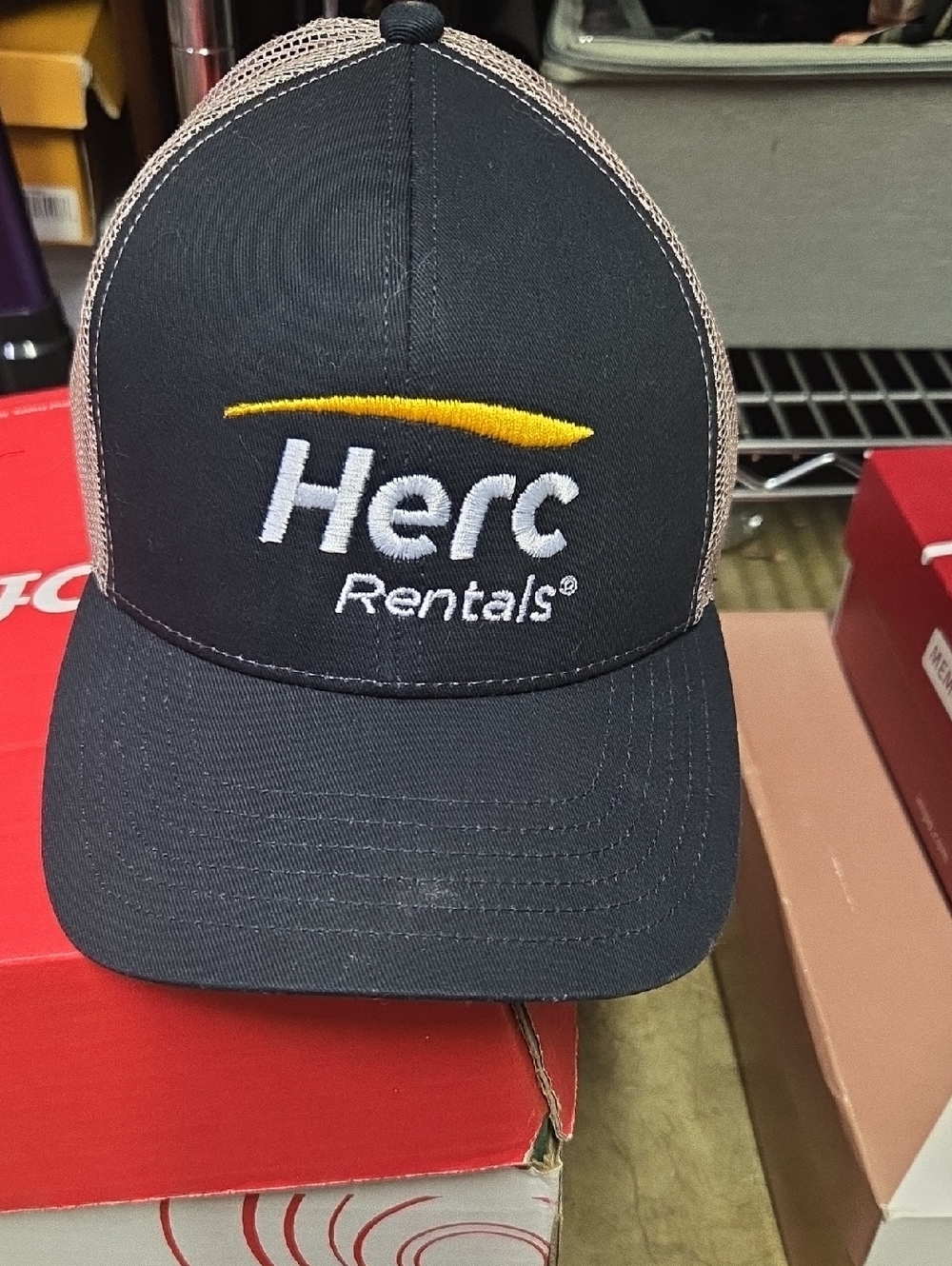 Herc Rentals Embroidered Trucker Hat - Black with Tan Mesh
